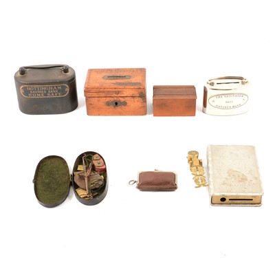 Lot 162 - Brass sovereign scales, sovereign purse, apothecary scales and five money boxes.