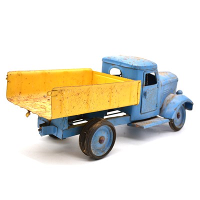 Lot 244 - Marx toy tractor; metal tipping truck; metal locomotive.