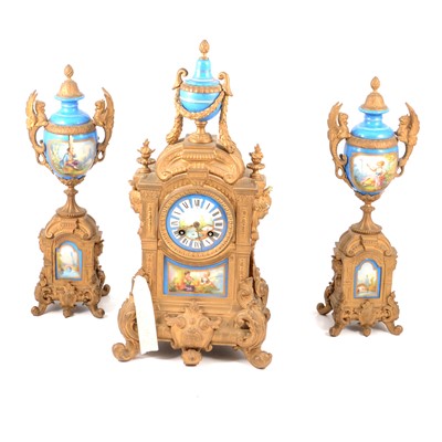 Lot 126 - Louis XVI style gilt metal and Bleu de Roi Sevres style porcelain three-piece mantel clock