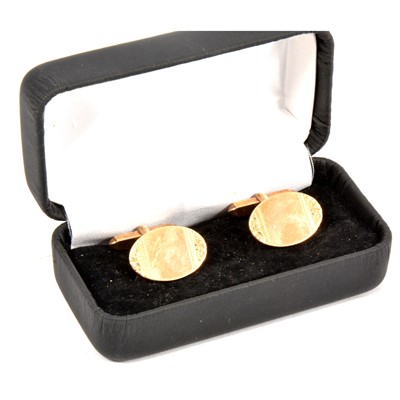 Lot 253 - A pair of 9 carat yellow gold cufflinks.