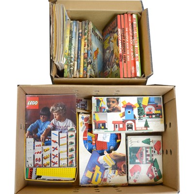 Lot 233 - Two boxes including Rupert annuals, other annuals, and a selection of vintage Lego sets.