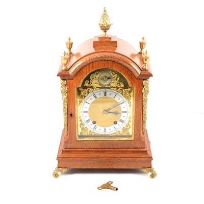 Lot 120 - A Winterhalder & Hofmeier oak cased bracket clock.