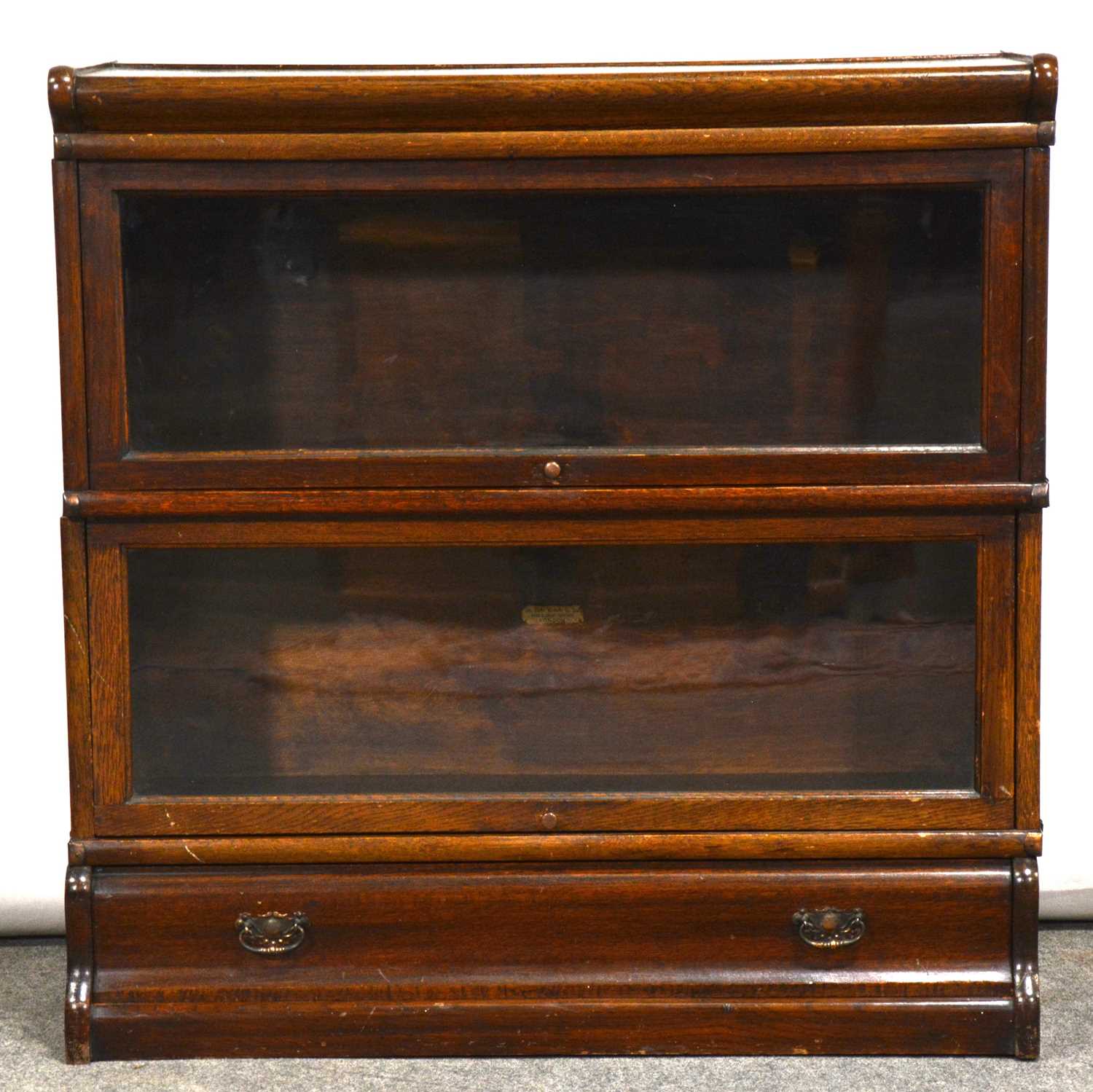 Lot 447 - Oak two-heights sectional bookcase