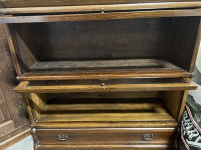 Lot 447 - Oak two-heights sectional bookcase