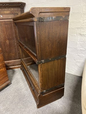 Lot 447 - Oak two-heights sectional bookcase