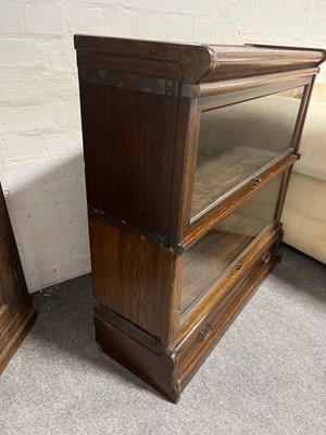 Lot 447 - Oak two-heights sectional bookcase