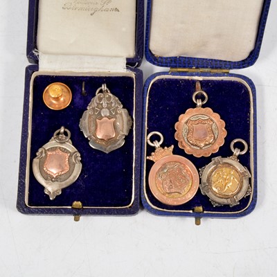 Lot 249 - Four silver fobs