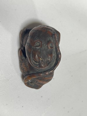 Lot 256 - Japanese carved wooden netsuke, designed as a tiger