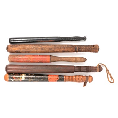 Lot 135 - Four wooden truncheons