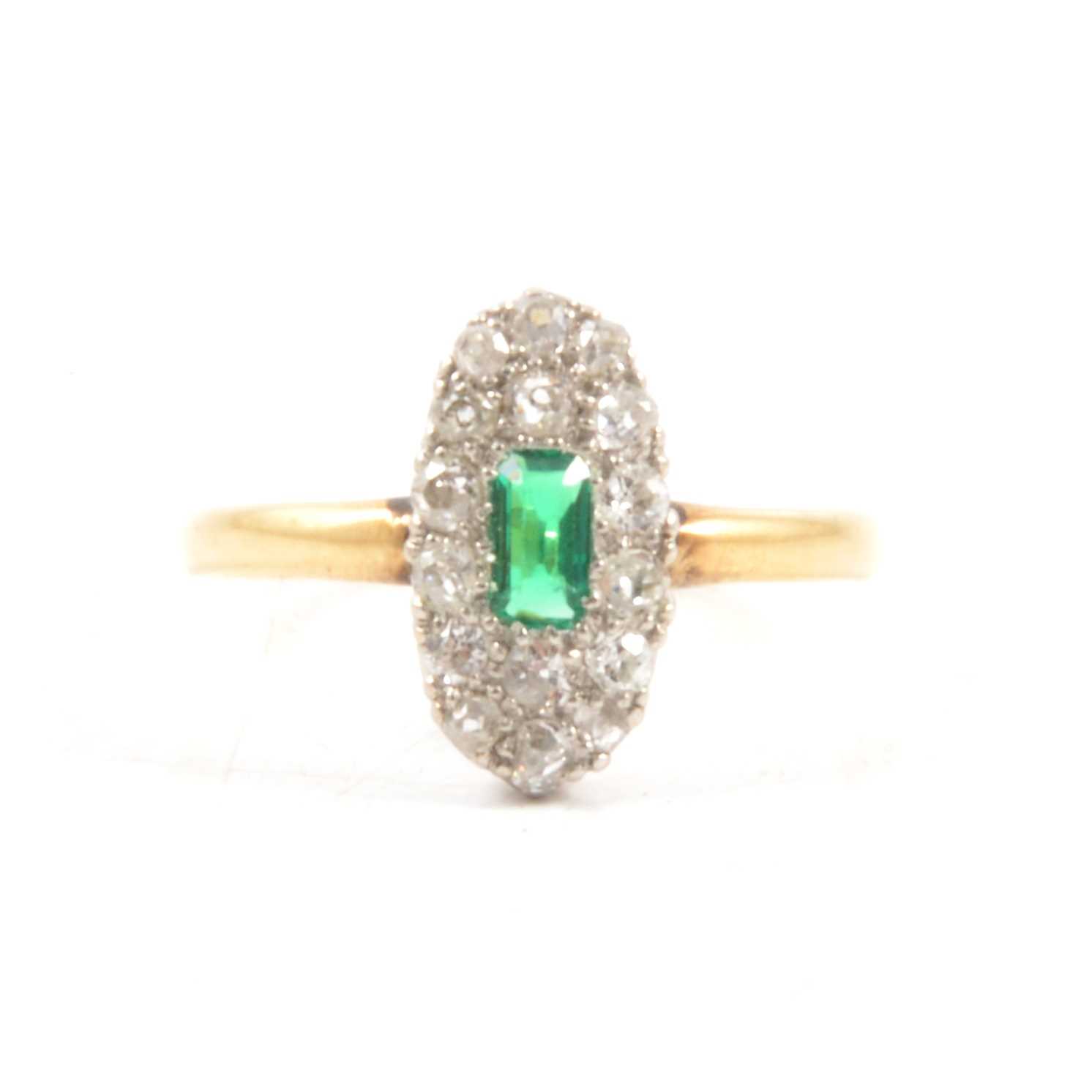Lot 73 - A diamond cluster ring with synthetic green stone.