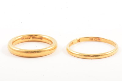 Lot 106 - Two gold wedding rings.