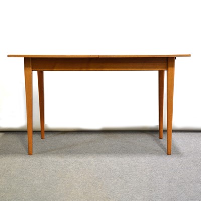 Lot 704 - Mid century teak dining suite and a telephone table