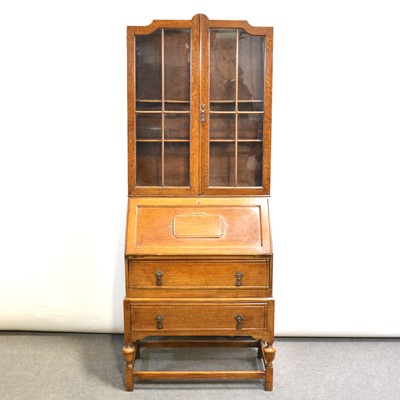 Lot 653 - 1940's oak bureau bookcase