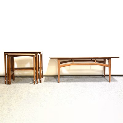 Lot 701 - Mid century teak coffee table and a similar nest of tables