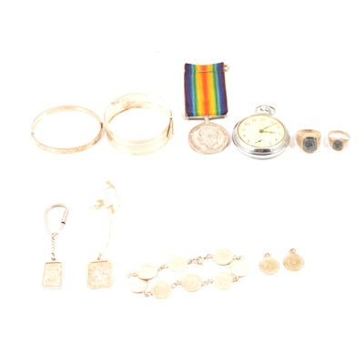 Lot 60 - A British War Medal1914-1918, two silver bangles, ingot, pocket watch, coin bracelet.