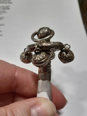 Lot 275 - A heart shaped beaded pin cushion, Royal Horicultural Society medal, baby's rattle and other silver.