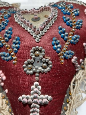Lot 275 - A heart shaped beaded pin cushion, Royal Horicultural Society medal, baby's rattle and other silver.