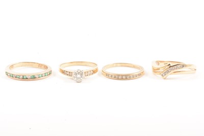 Lot 109 - Four 9 carat gold diamond rings