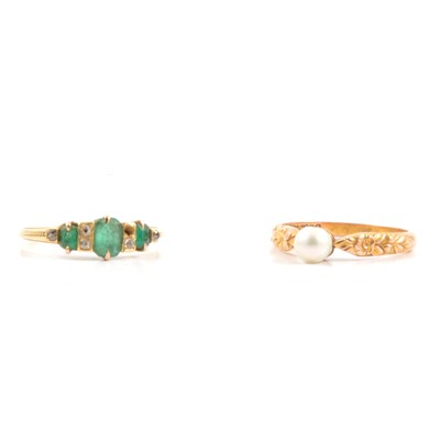 Lot 28 - A cultured pearl ring and emerald ring.