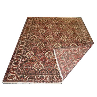 Lot 516 - Iranian woolen machine-made carpet