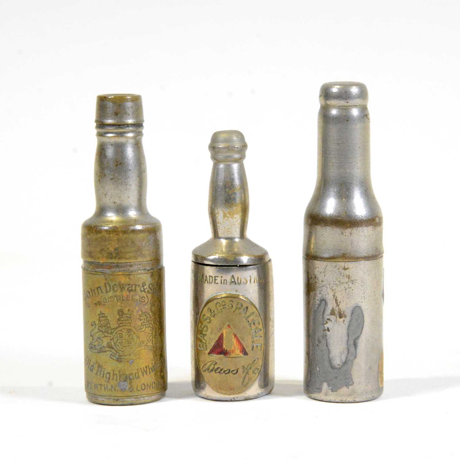 Lot 64 - Two novelty bottle corkscrews and a novelty bottle vesta case