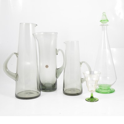 Lot 13 - Three Swedish glass water jugs, smoky glass, and other decanter set