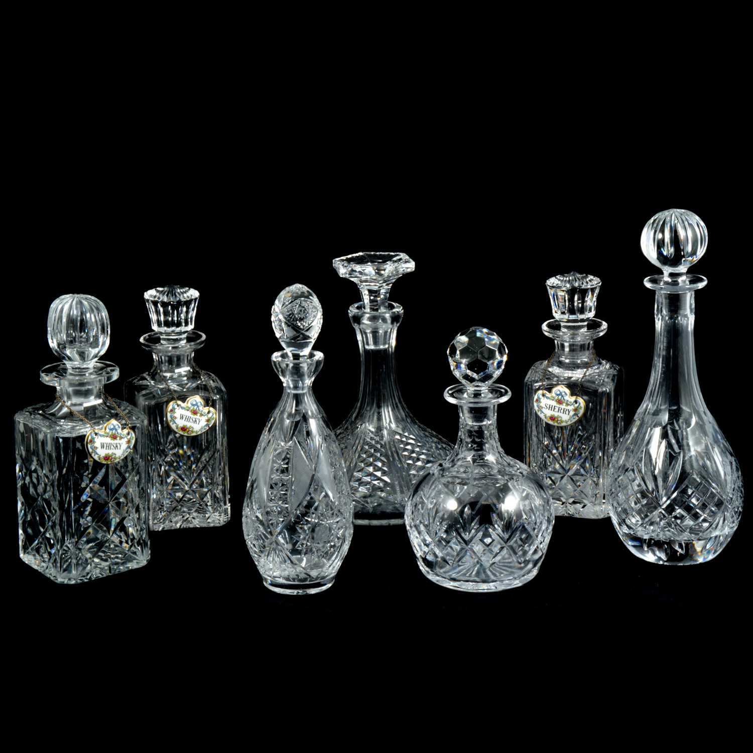 Lot 38 - Seven cut glass decanters