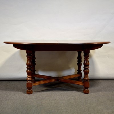 Lot 722 - Ercol elm table and chairs