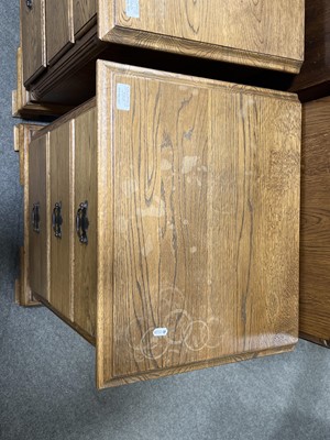 Lot 700 - Oak chest of drawers and two matching bedside sets of drawers