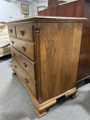 Lot 700 - Oak chest of drawers and two matching bedside sets of drawers