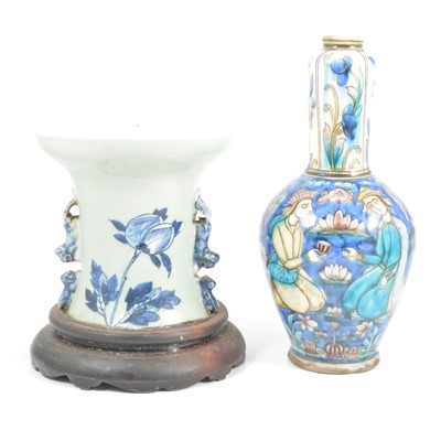 Lot 19 - Persian pottery vase and a Chinese porcelain jardiniere converted from a vase