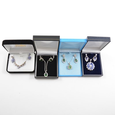 Lot 405 - Four gemset necklace and earring suites.