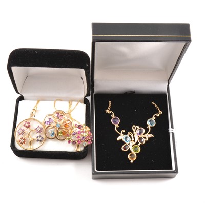 Lot 402 - A multi-gemset necklet and three multi-gemset pendants with yellow metal chains.