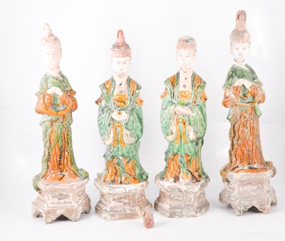 Lot 151 - Two pairs of Chinese earthenware tomb attendant figures