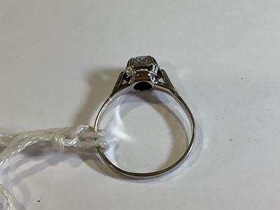 Lot 4 - A diamond solitaire ring.