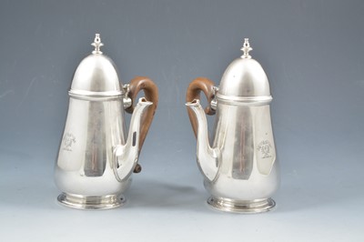 Lot 256 - Pair of silver side handled coffee pots