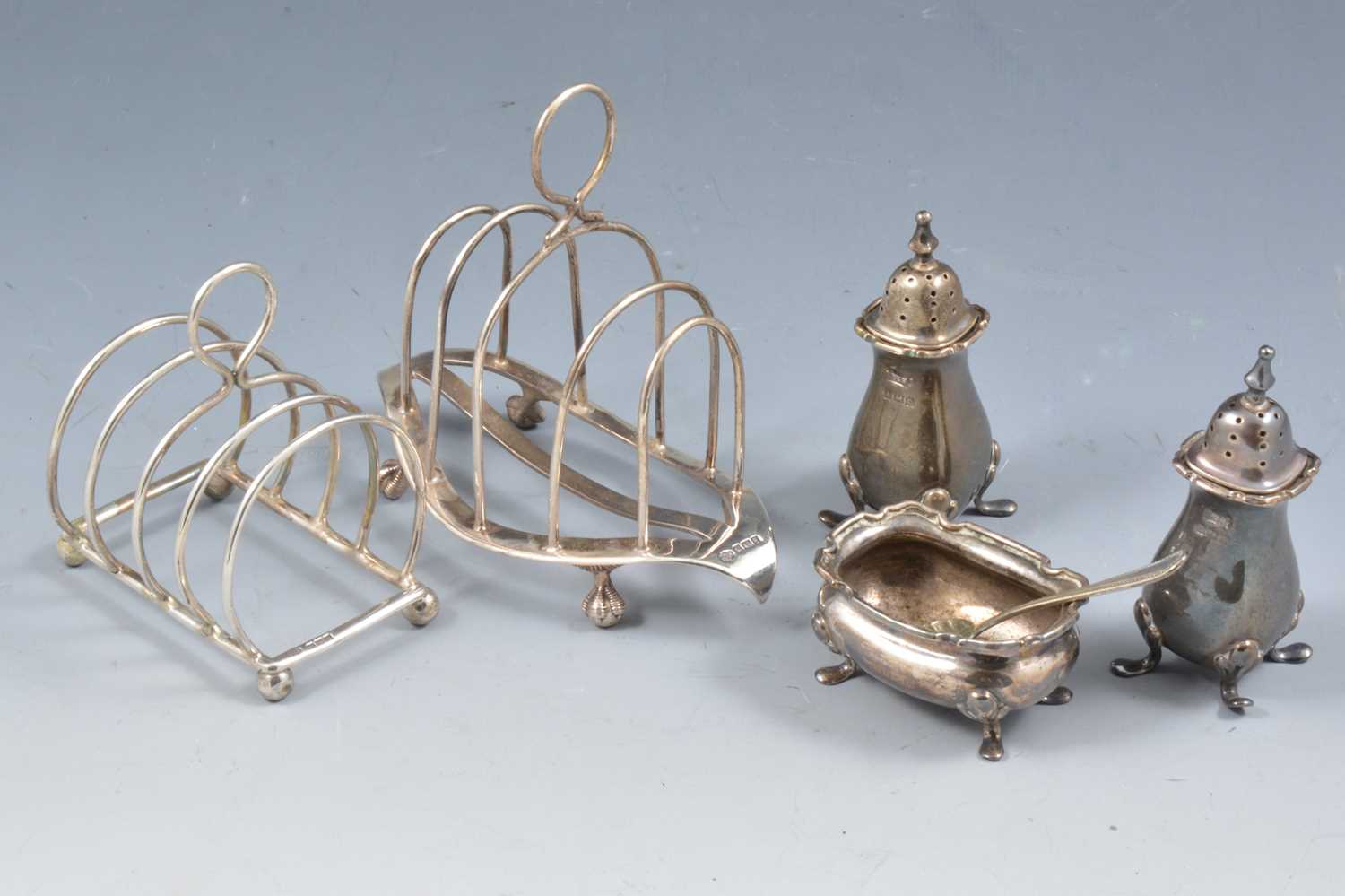 Lot 261 - Small silver toast rack, etc.,