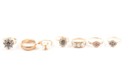 Lot 118 - A collection of gold, silver and gilt metal rings.