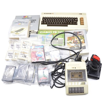 Lot 282 - Commadore VIC-20 colour computer, with cables, joysticks, selection of cartridge software