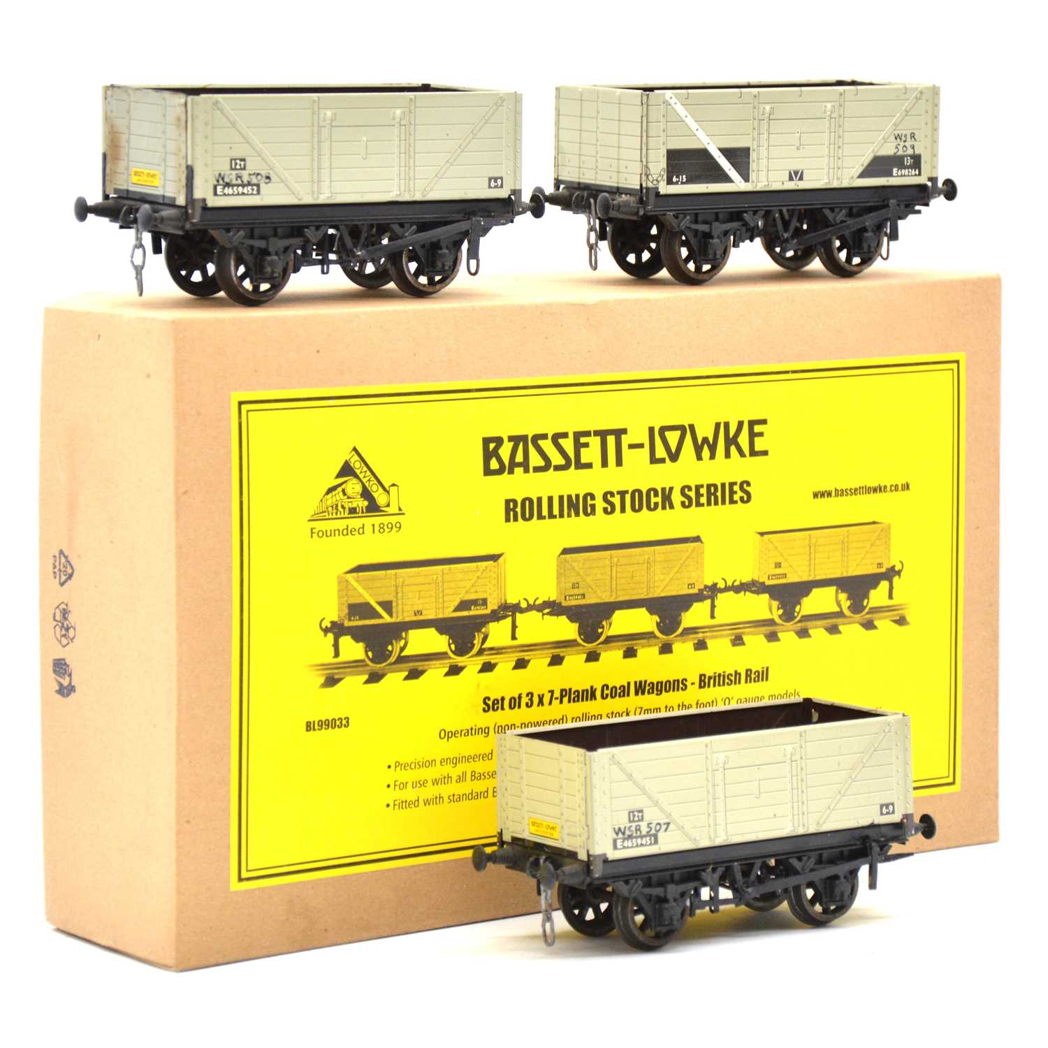 Lot 105 - Bassett-Lowke O gauge model railway wagons, set of 3 BR 7-plank coal wagons, boxed