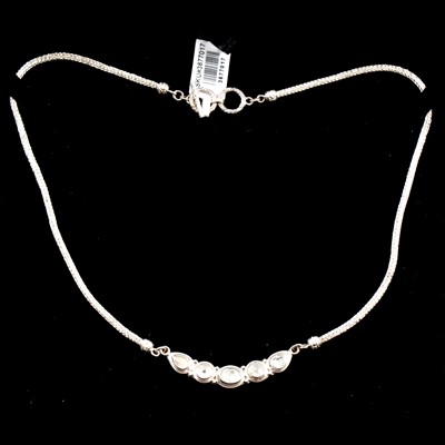 Lot 446 - A silver and diamond necklace.