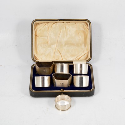 Lot 274 - Four silver napkin rings and three others