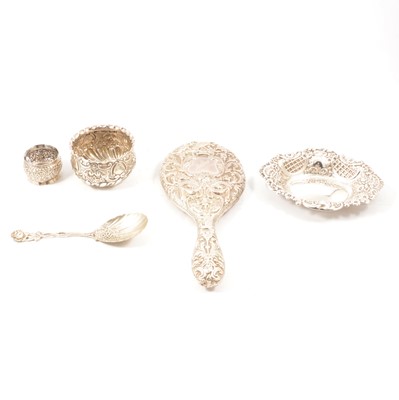 Lot 278 - A silver repousse mirror, dish, bowl, napkin ring and 800 spoon.