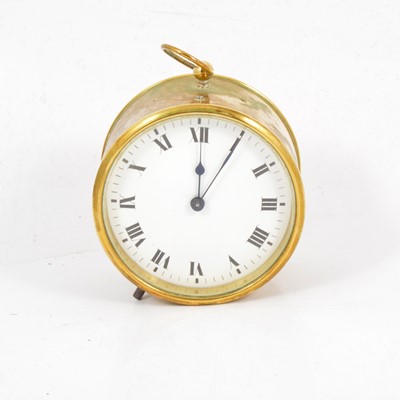 Lot 106 - Small brass cased clock