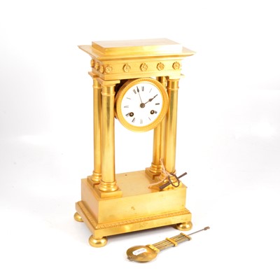 Lot 117 - French gilt metal portico clock