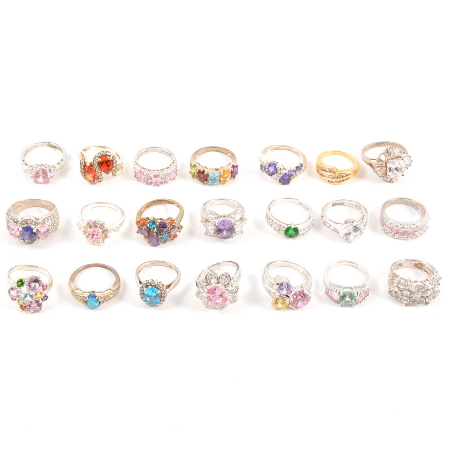 Lot 125 Thirty modern gemset white metal rings.