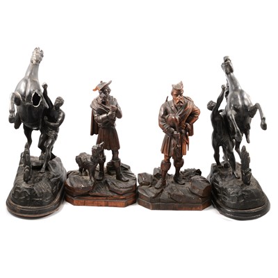 Lot 192 - Pair of carved Highlander figures, and a pair of spelter Marley Horses