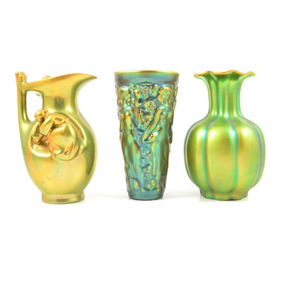 Lot 32 - Zsolnay Pecs - a jug and two vases.
