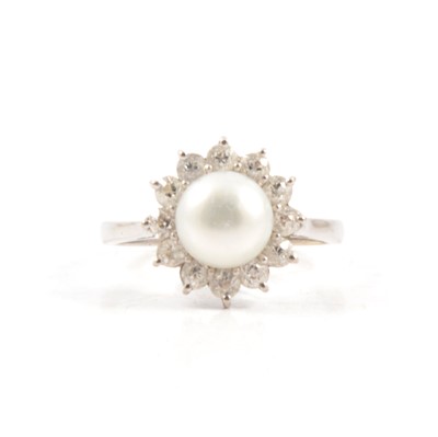 Lot 84 - A cultured pearl and diamond ring.