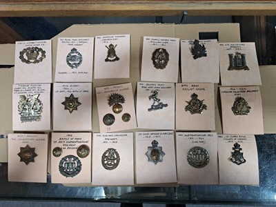 Lot 145 - Approx. 80 WW1 military cap badges, lapel badges, and buttons.